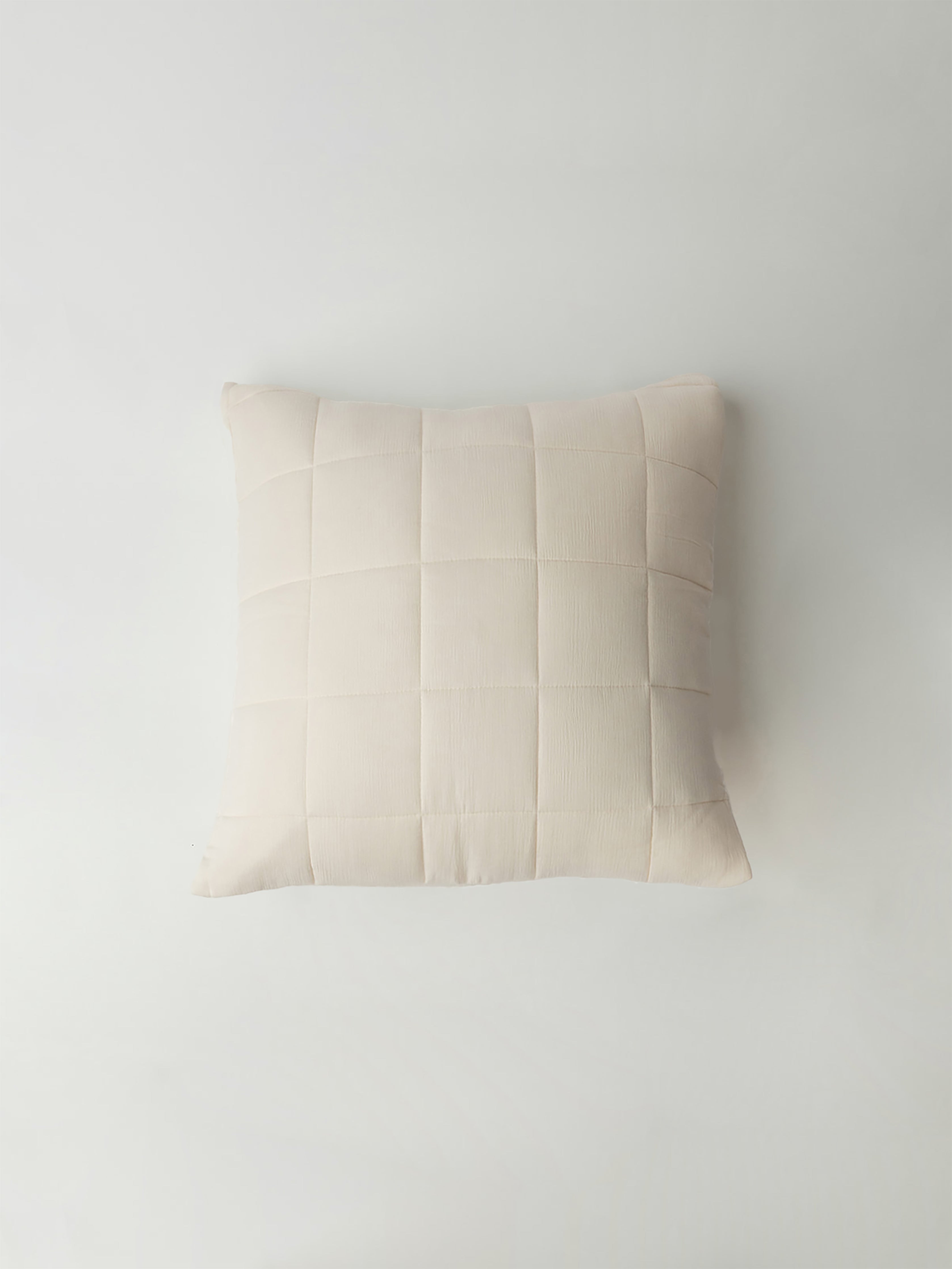 Buttermilk Aire Bamboo Box Quilt Euro Sham. The sham is photographed with a white background|Color:Buttermilk|Size:Euro
