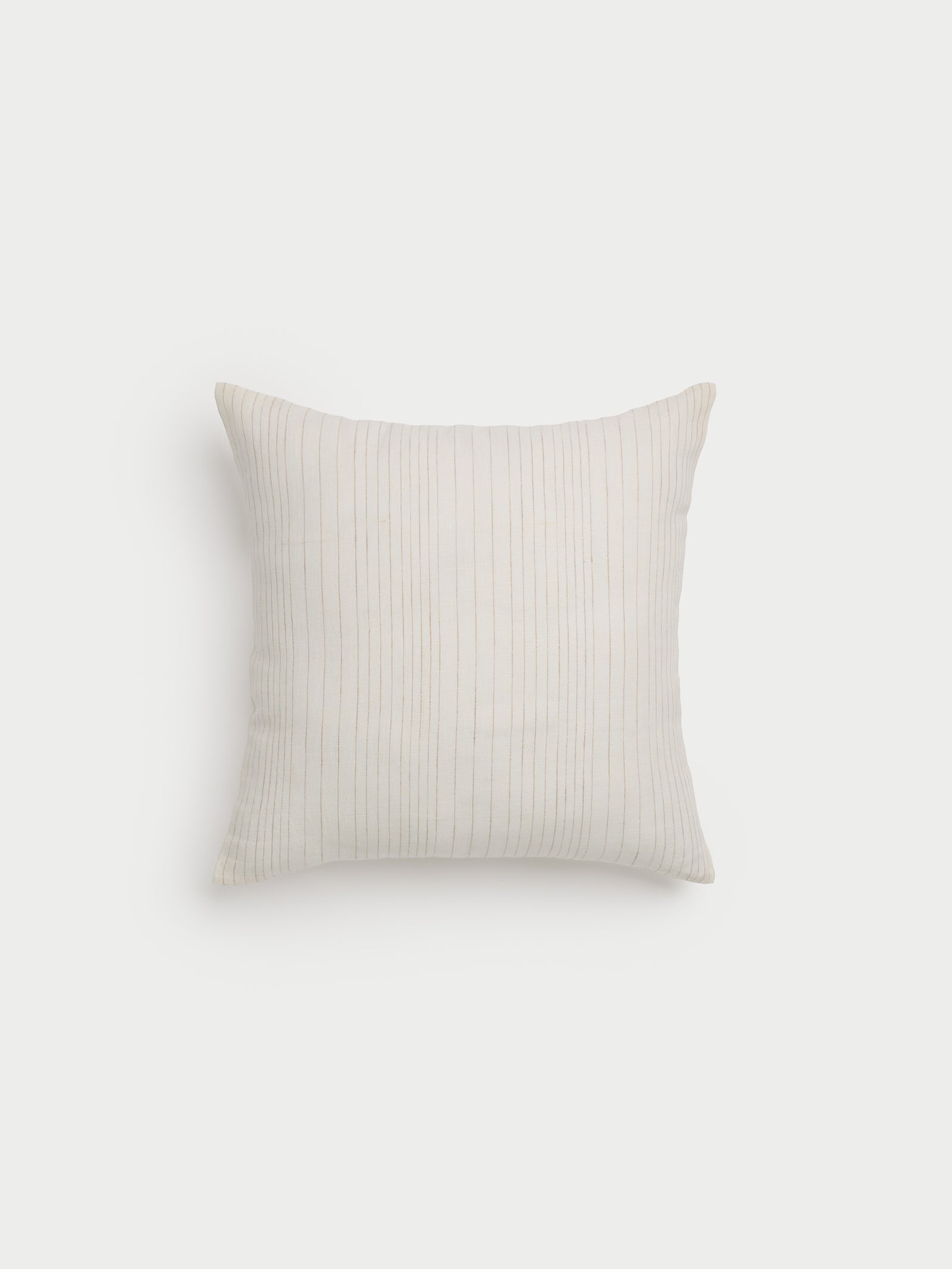 Cozy Earth striped throw pillow with plain white background 