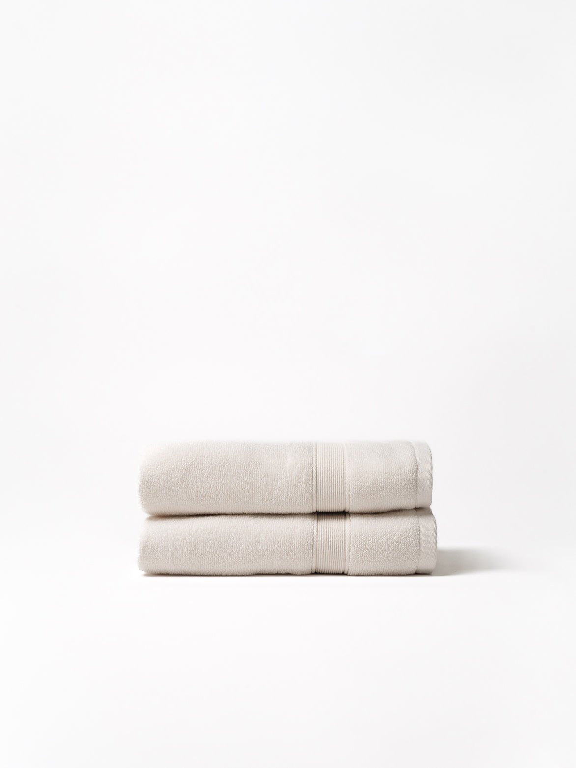 Seashell hand towels folded with white background 
