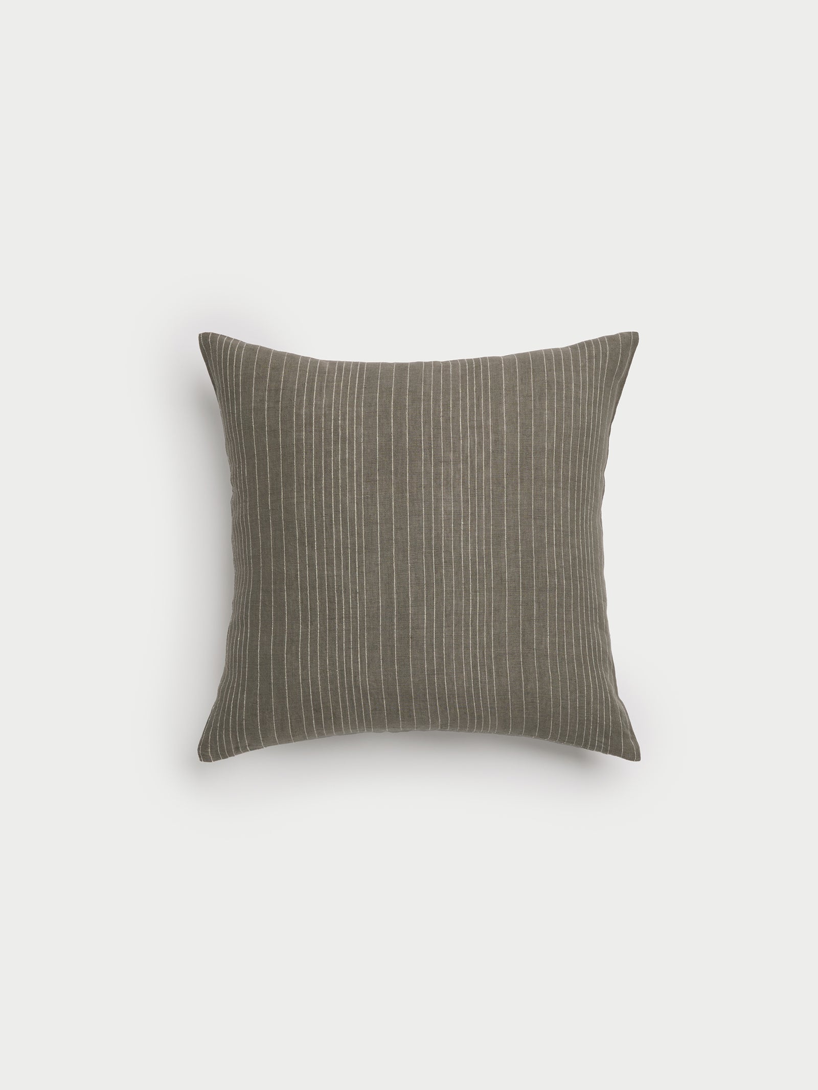 Cozy Earth striped throw pillow with plain white background 