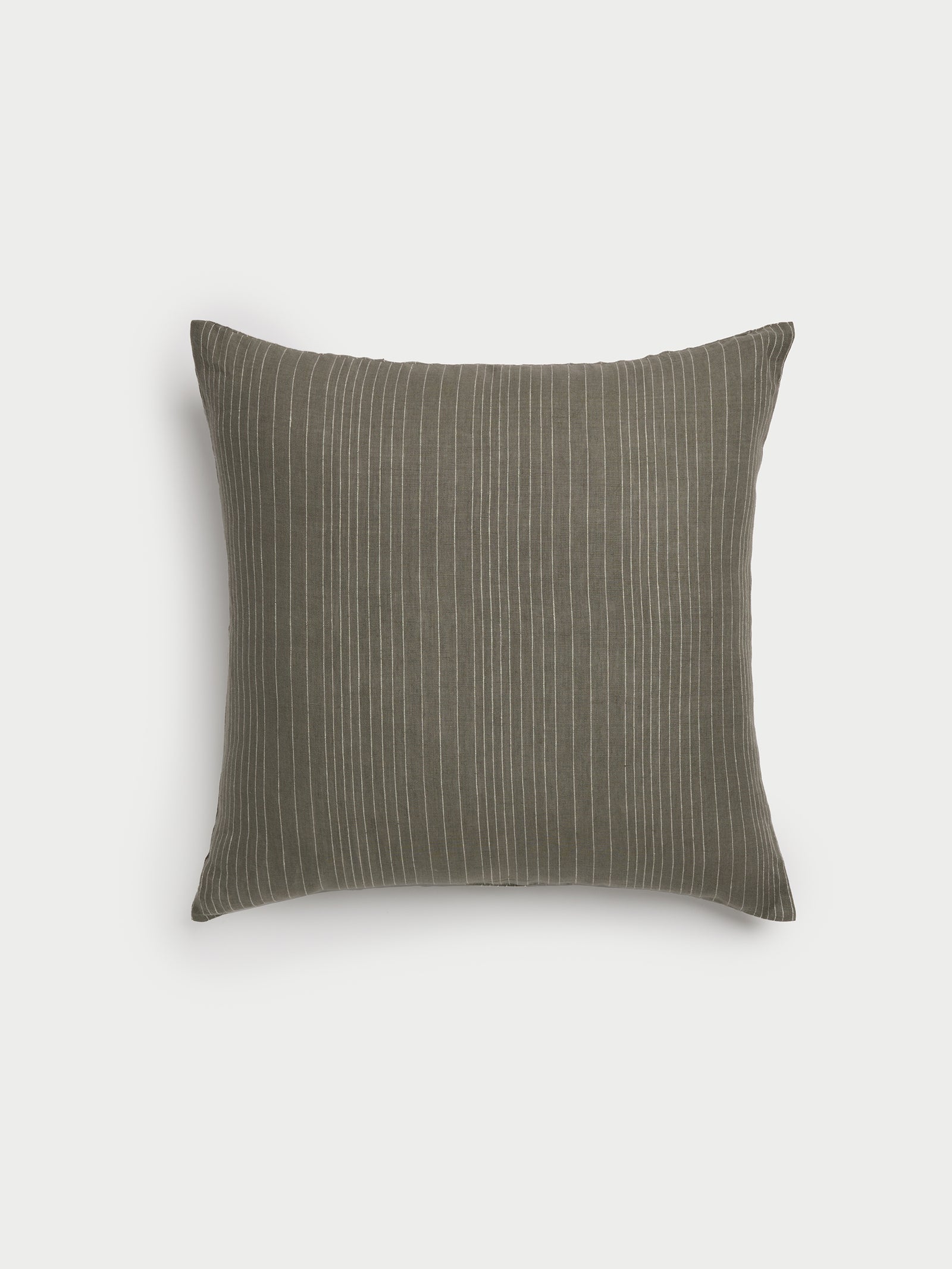 Cozy Earth striped throw pillow with plain white background 