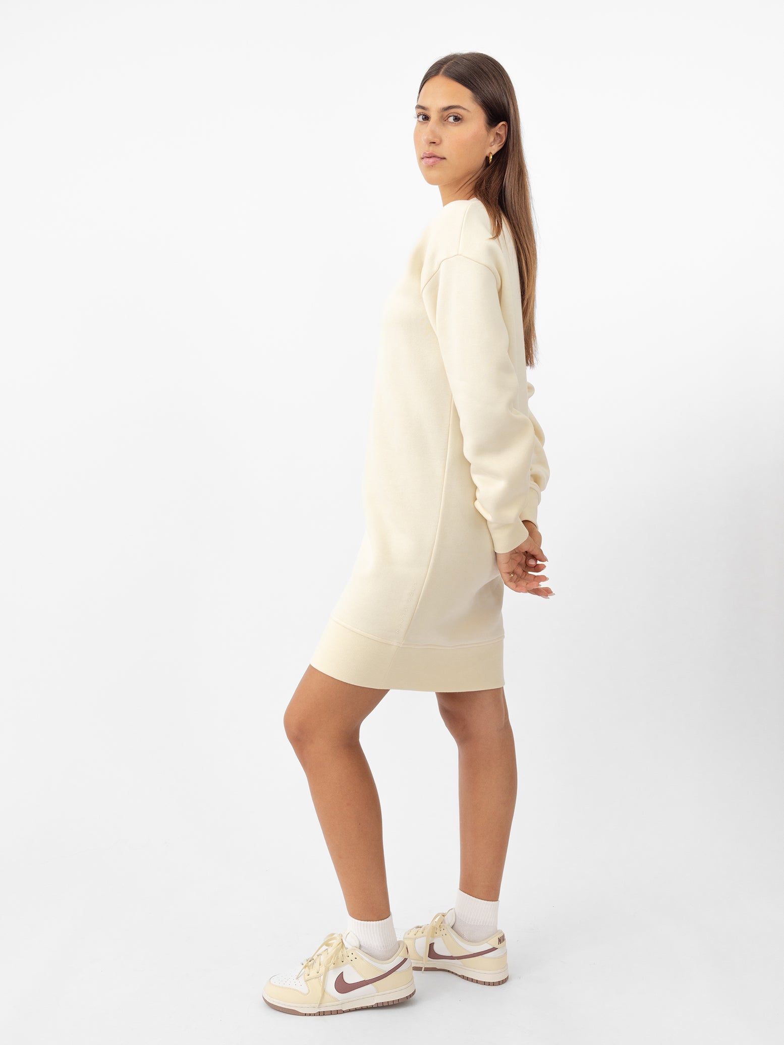 Woman wearing Alabaster CityScape Crewneck Dress with white background 