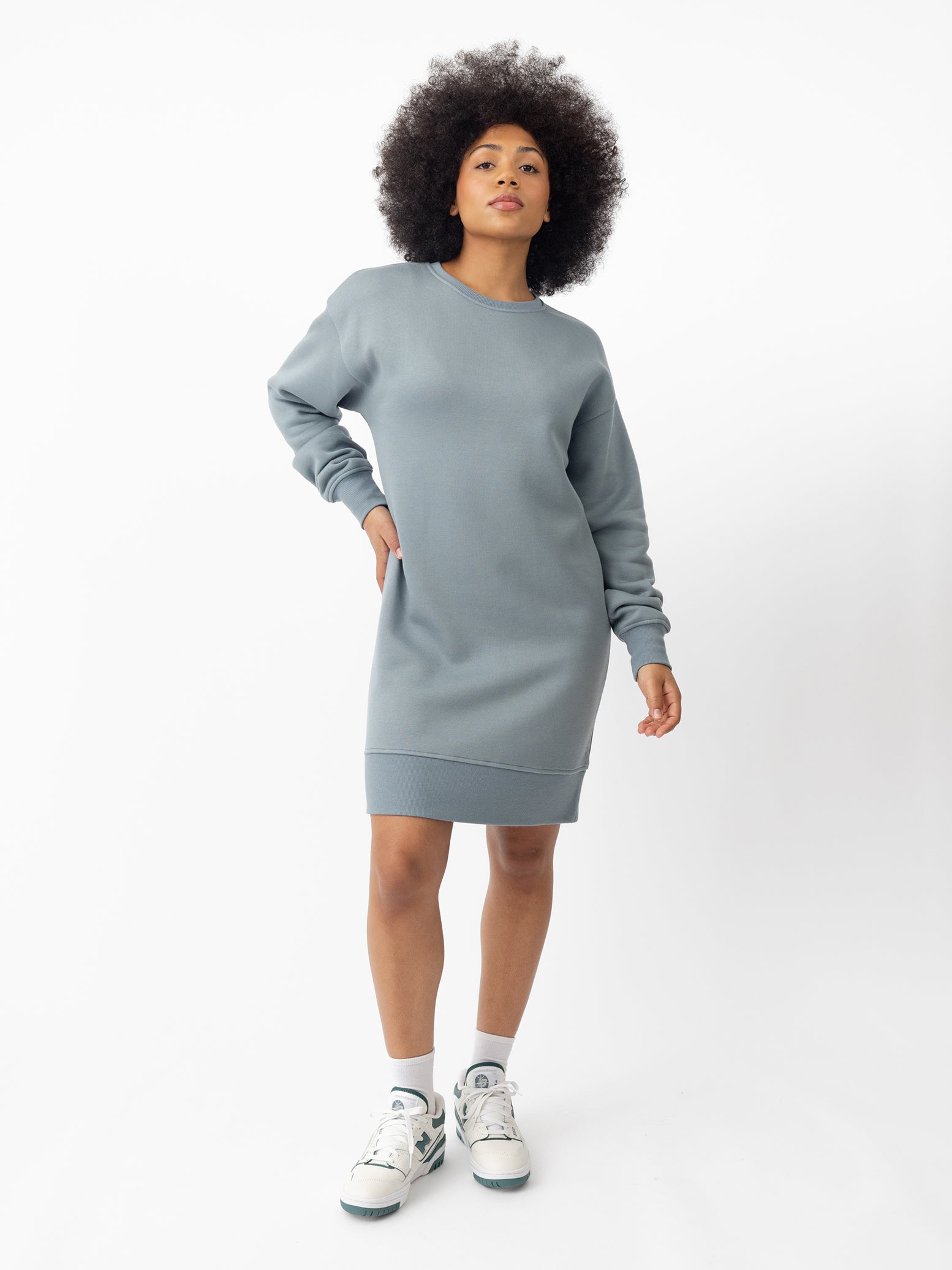 Woman wearing Smokey Blue CityScape Crewneck Dress with white background 
