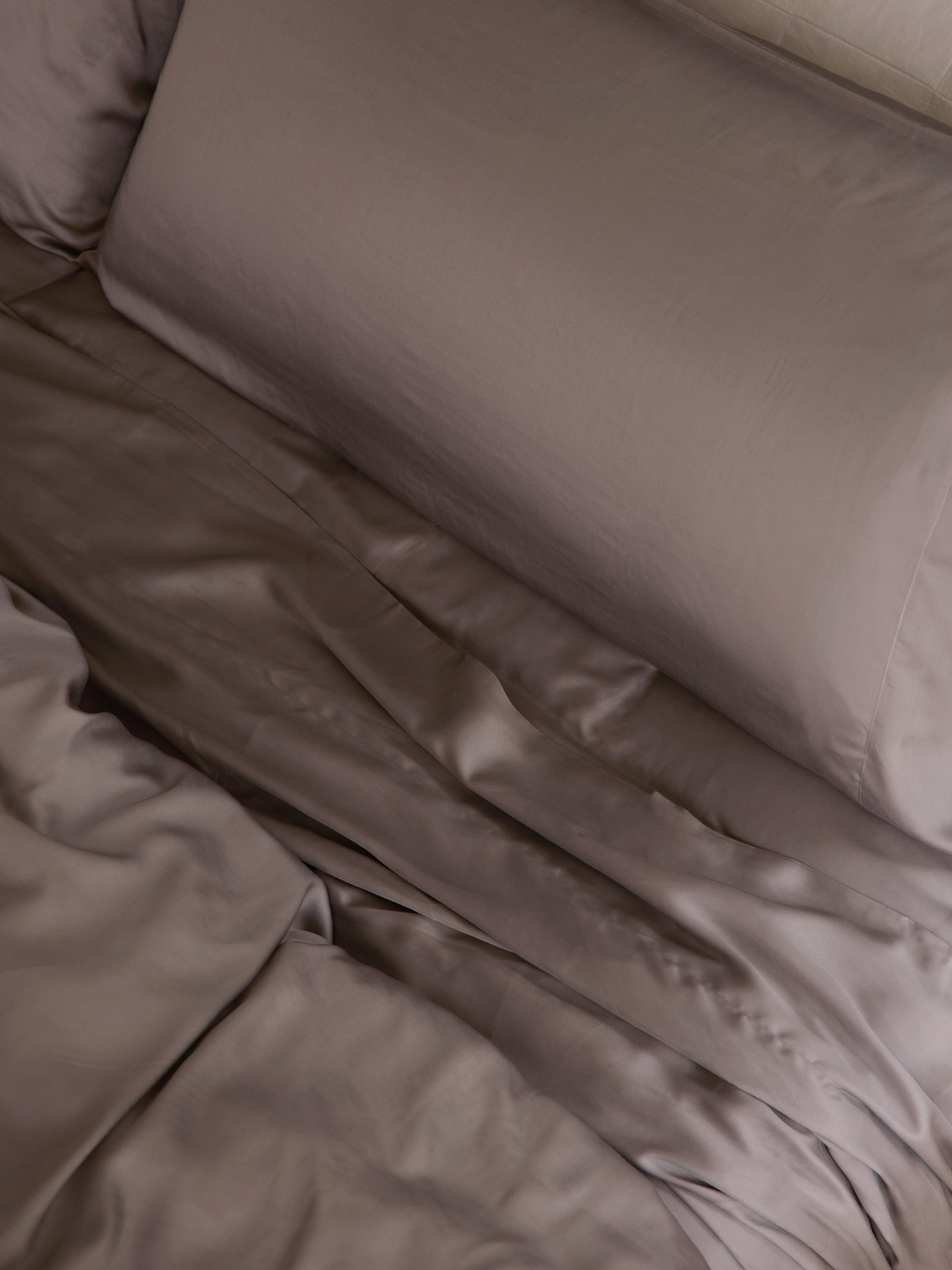 Close up of stone bedding on a bed 