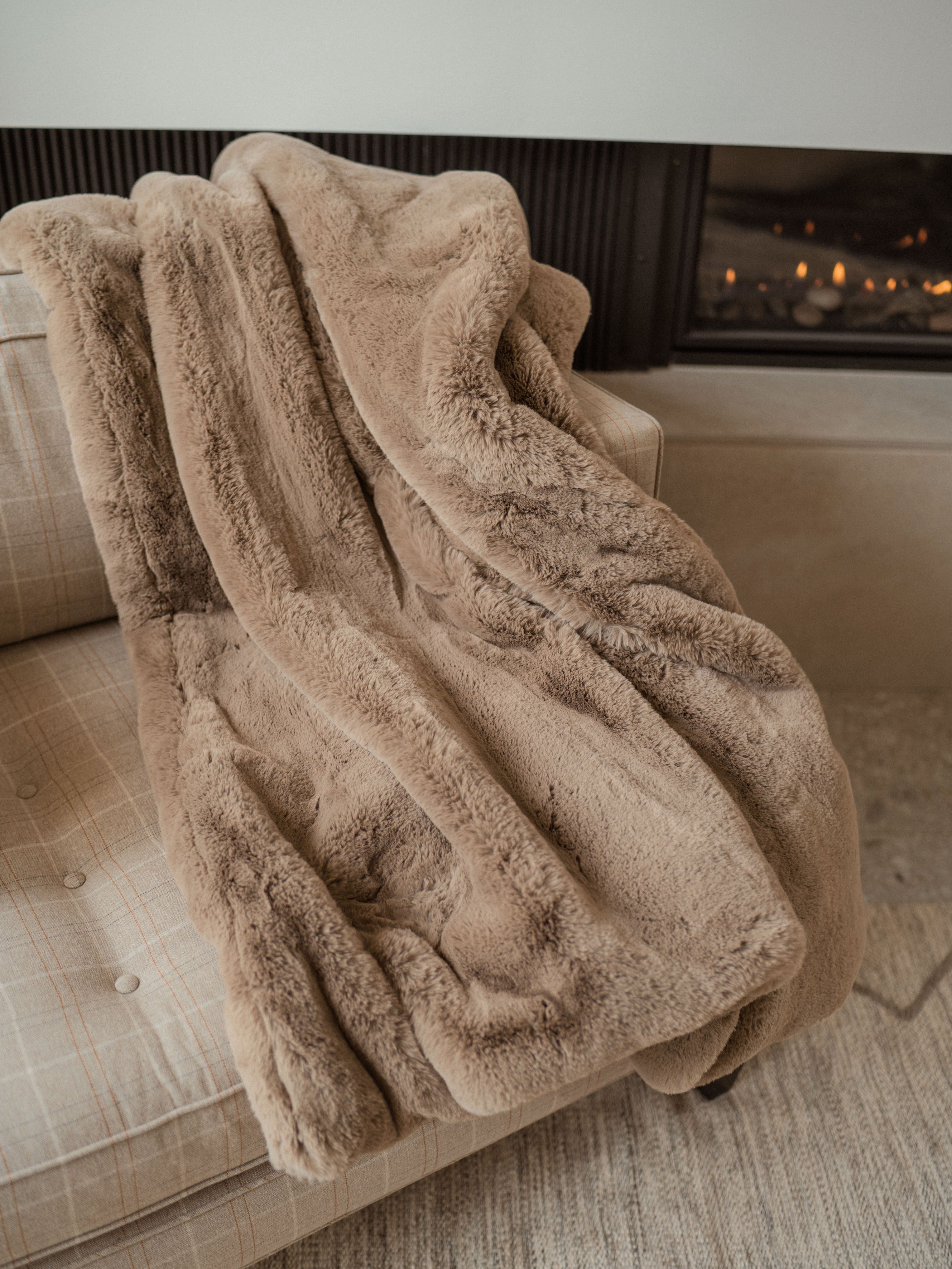 Walnut Oversized Throw Cuddle Blanket on the couch by the fireplace |Color:Walnut