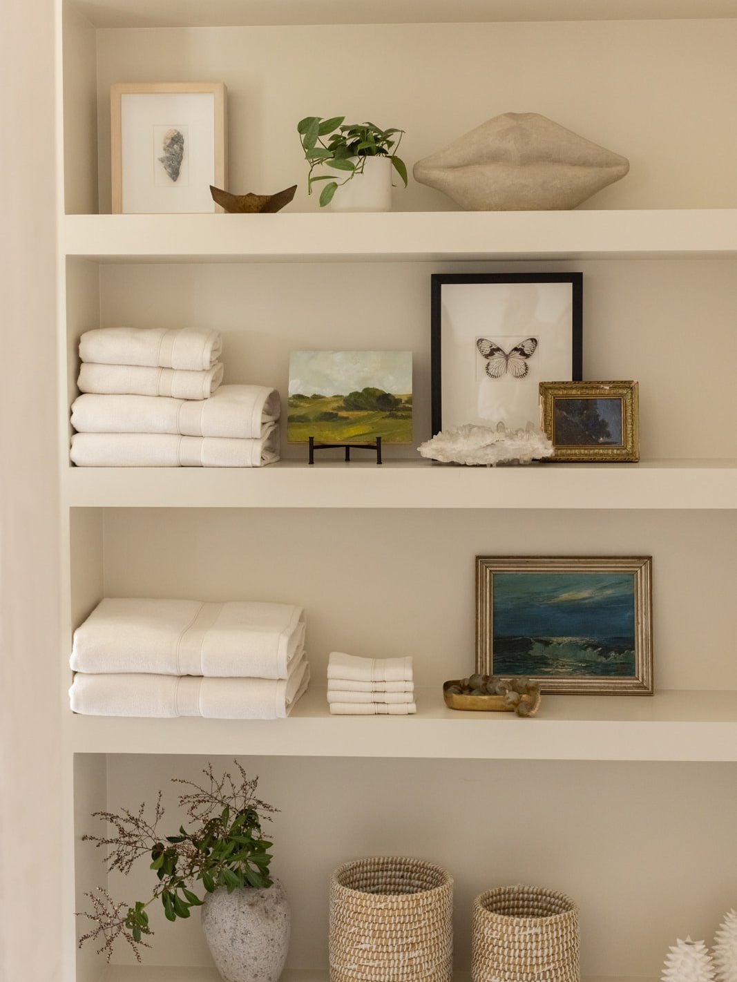 Complete luxe bath bundle folded on shelves 