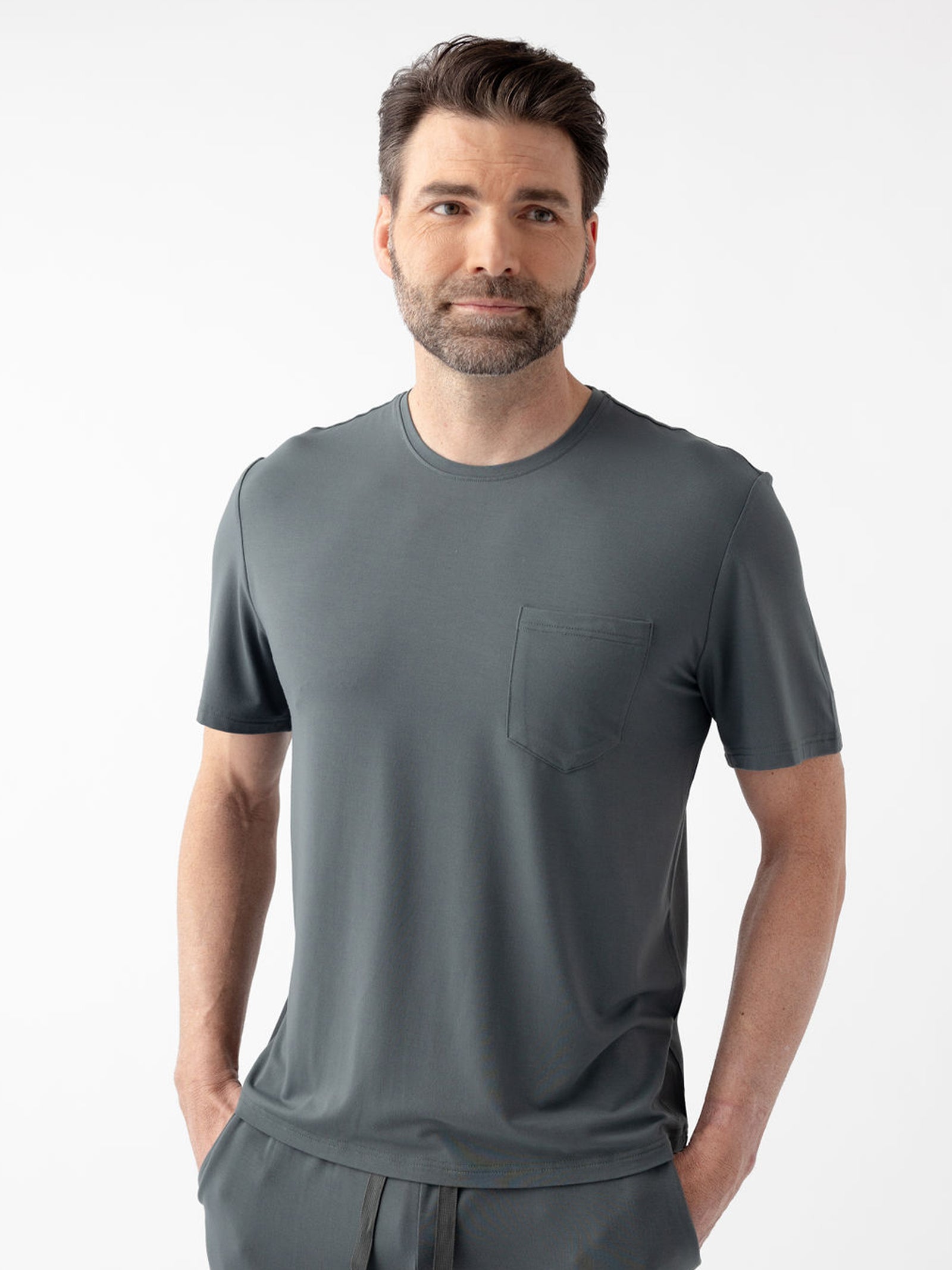 Man wearing storm pajama shirt with white background 