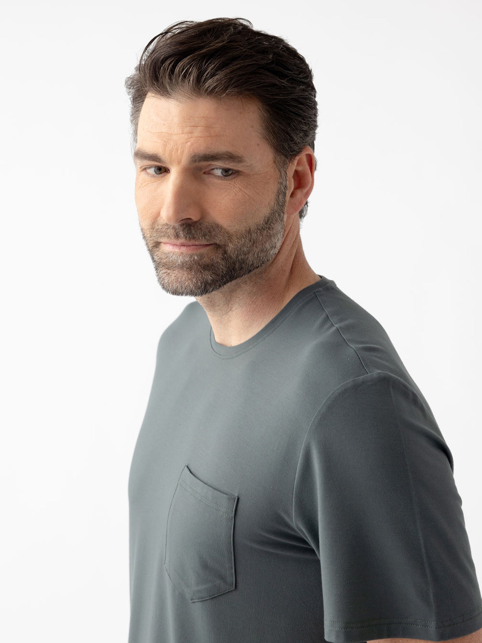 Close up of man wearing storm pajama shirt 