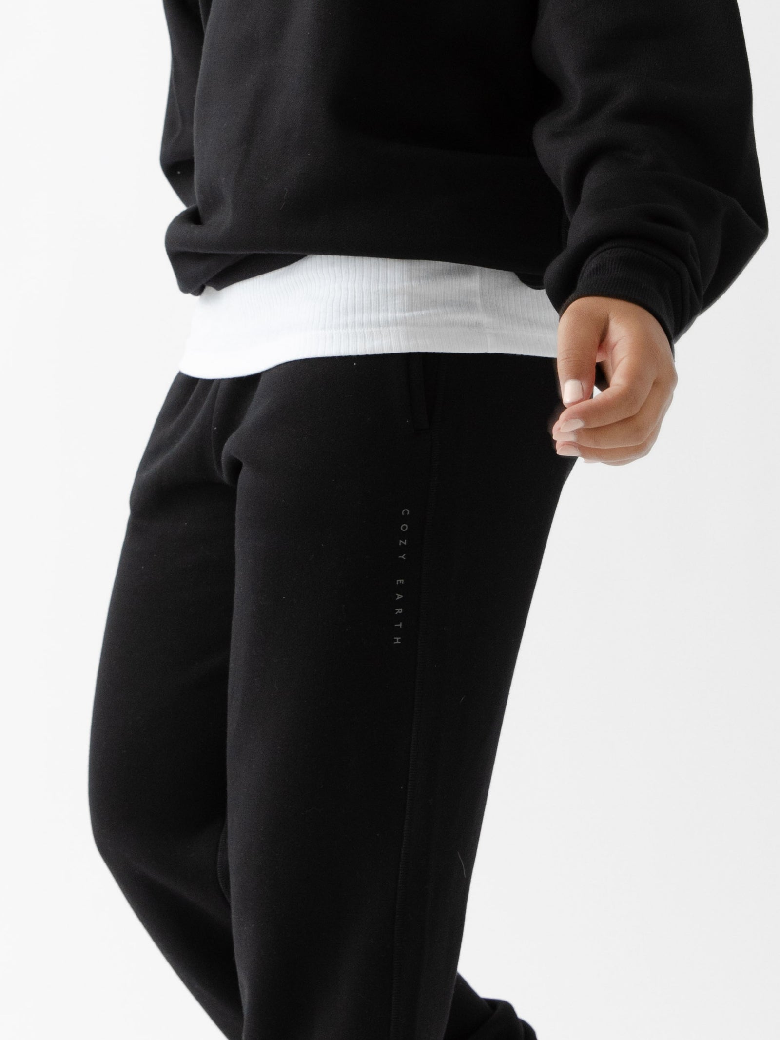 Black cityscape sweatpants with cozy earth logo 
