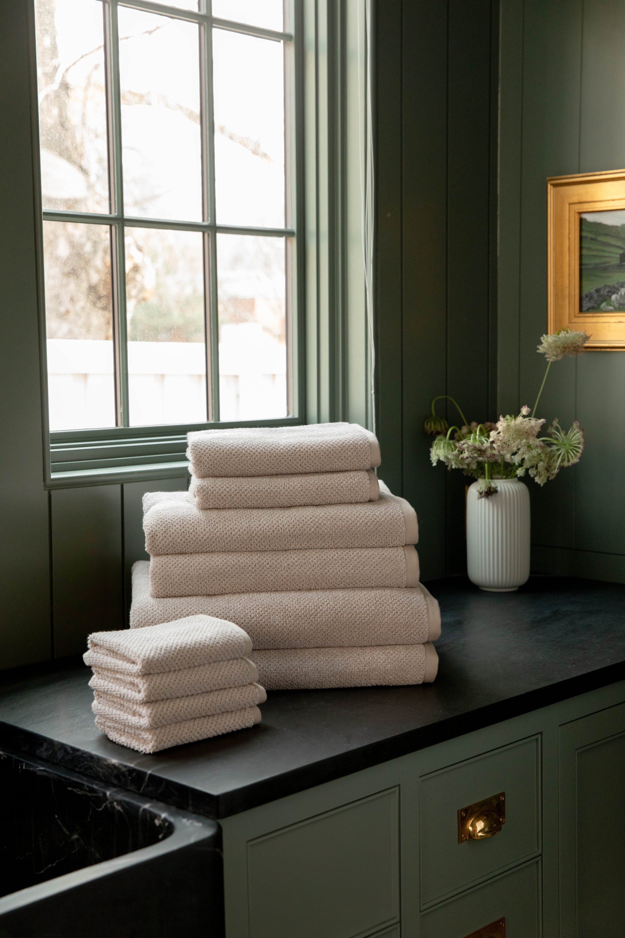 Complete Nantucket Bath Bundle in the color Heathered Sand. Photo of Complete Nantucket Bath Bundle taken with the Heathered Sand Bundle resting on a bathroom countertop. |Color: Heathered Sand